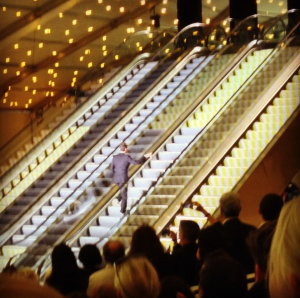 Marc Jacobs runs up the escalator